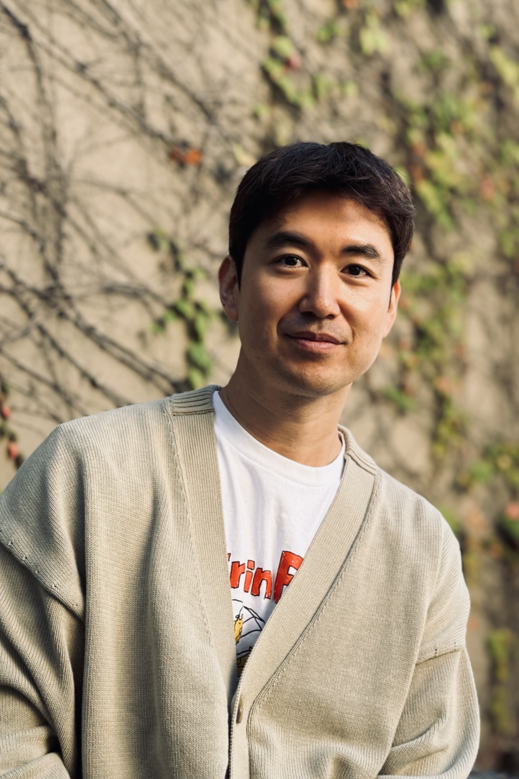 Portrait of David C. Jeong outdoors